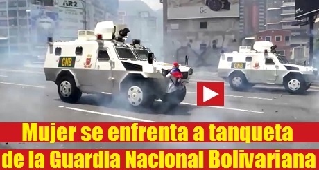 Venezolana enfrenta tanqueta GNB Caracas